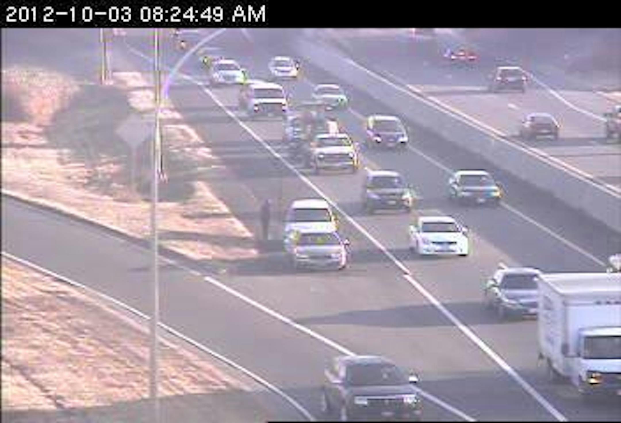 Two cars on the right shoulder at Hwy. 100 and France Av. in Brooklyn Center