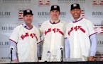 Baseball Hall of Fame inductees Edgar Martinez, left, Mike Mussina, center, and Mariano Rivera, right, pose for photographs during news conference Wed