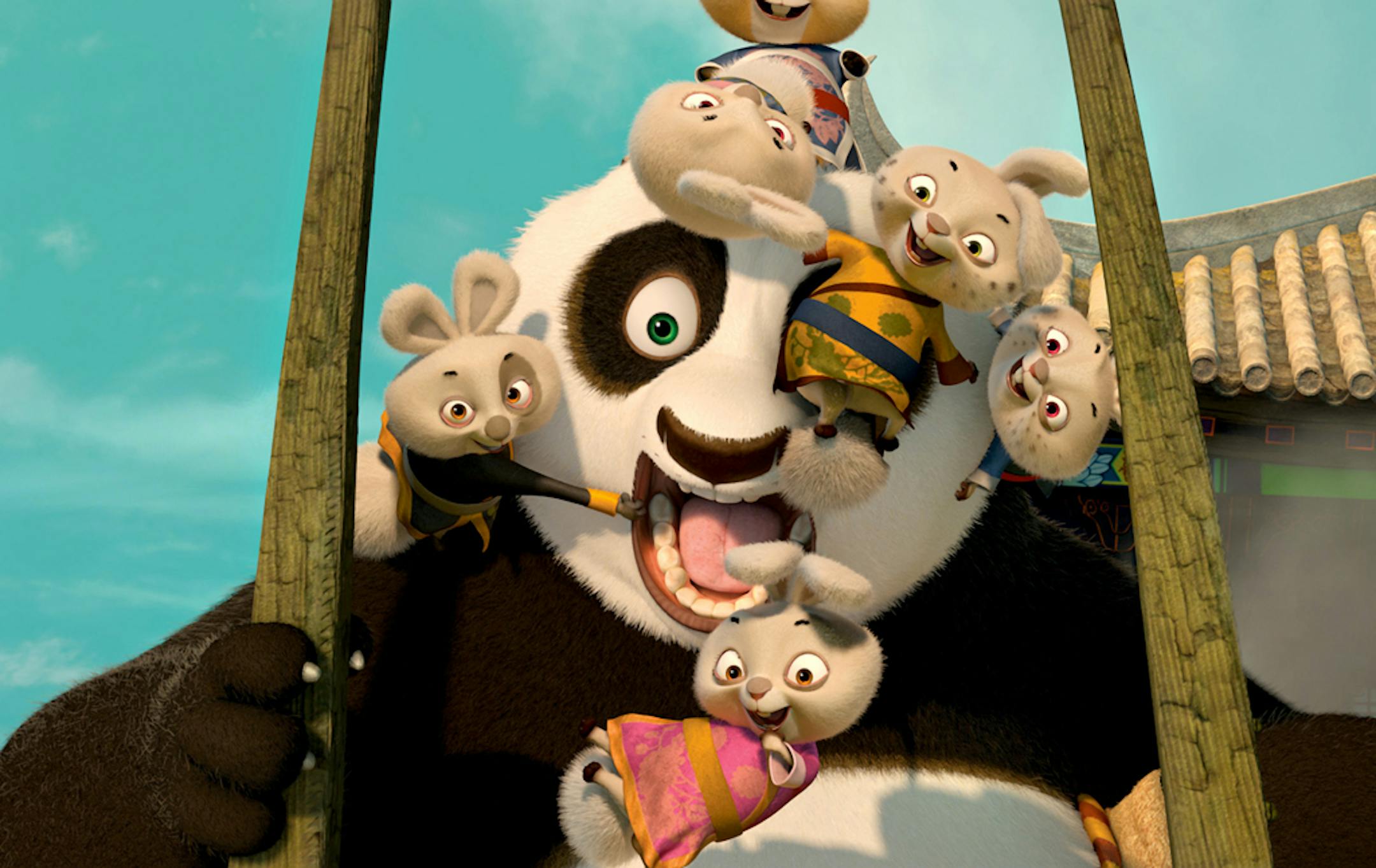 Po, the voice of Jack Black, is joined by a group of bunnies during a wild rickshaw chase in "Kung Fu Panda 2."