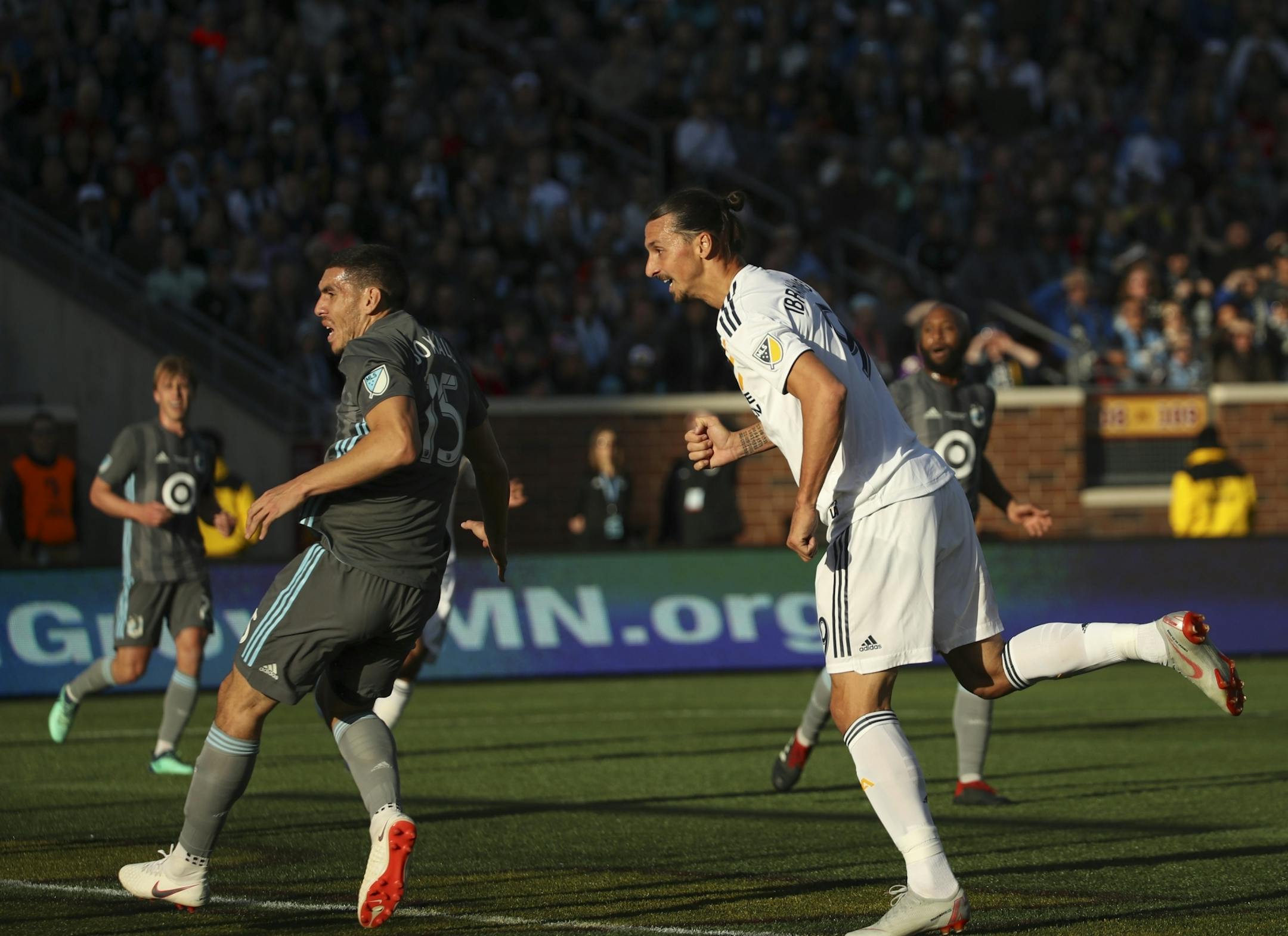 Los Angeles Galaxy forward Zlatan Ibrahimovic (9) watches his first half goal find the mark. With him was Minnesota United defender Michael Boxall (15).