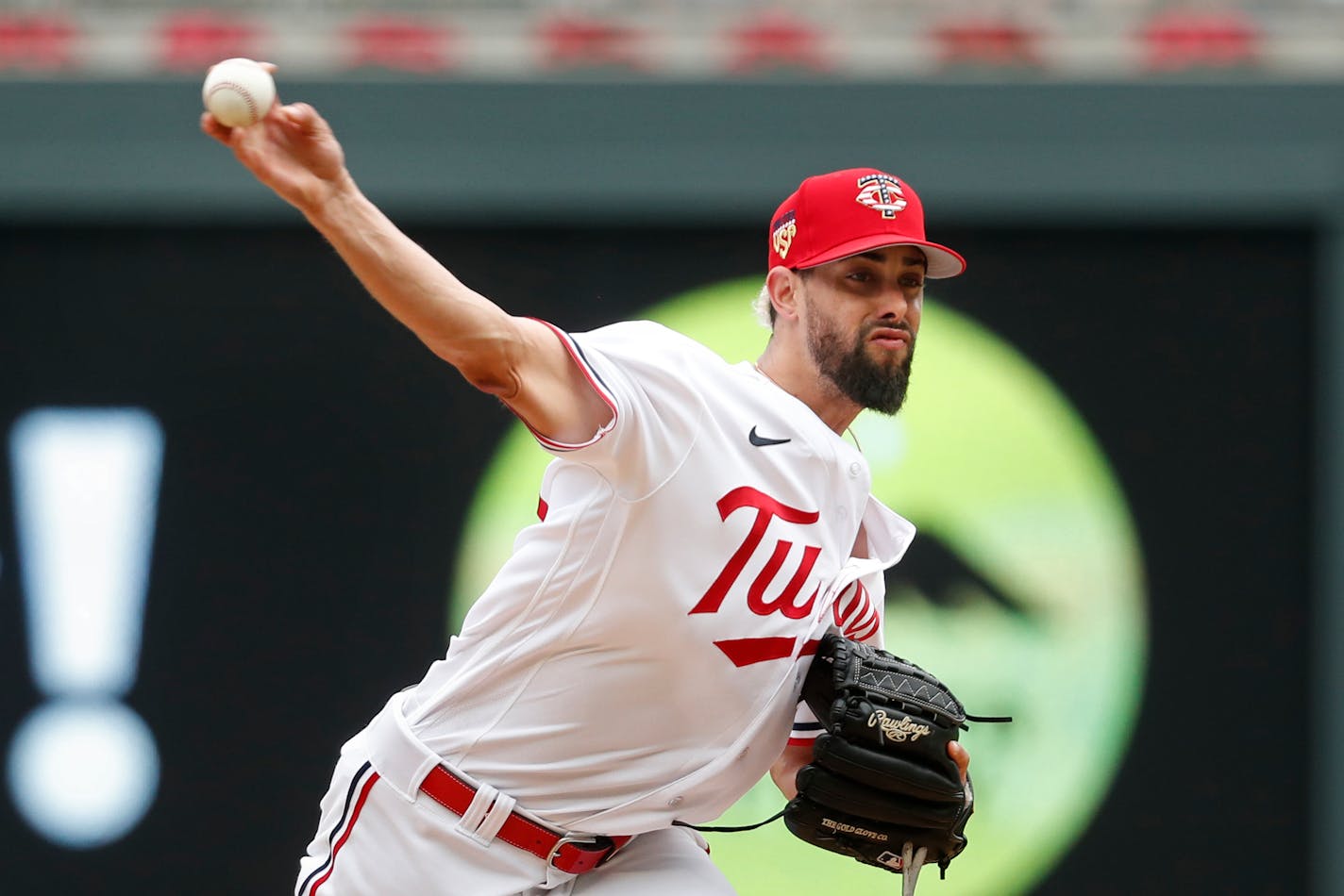 Minnesota Twins relief pitcher Jorge Lopez throws to the Kansas City Royals in the ninth inning of a baseball game, Tuesday, July 4, 2023, in Minneapolis. (AP Photo/Bruce Kluckhohn)