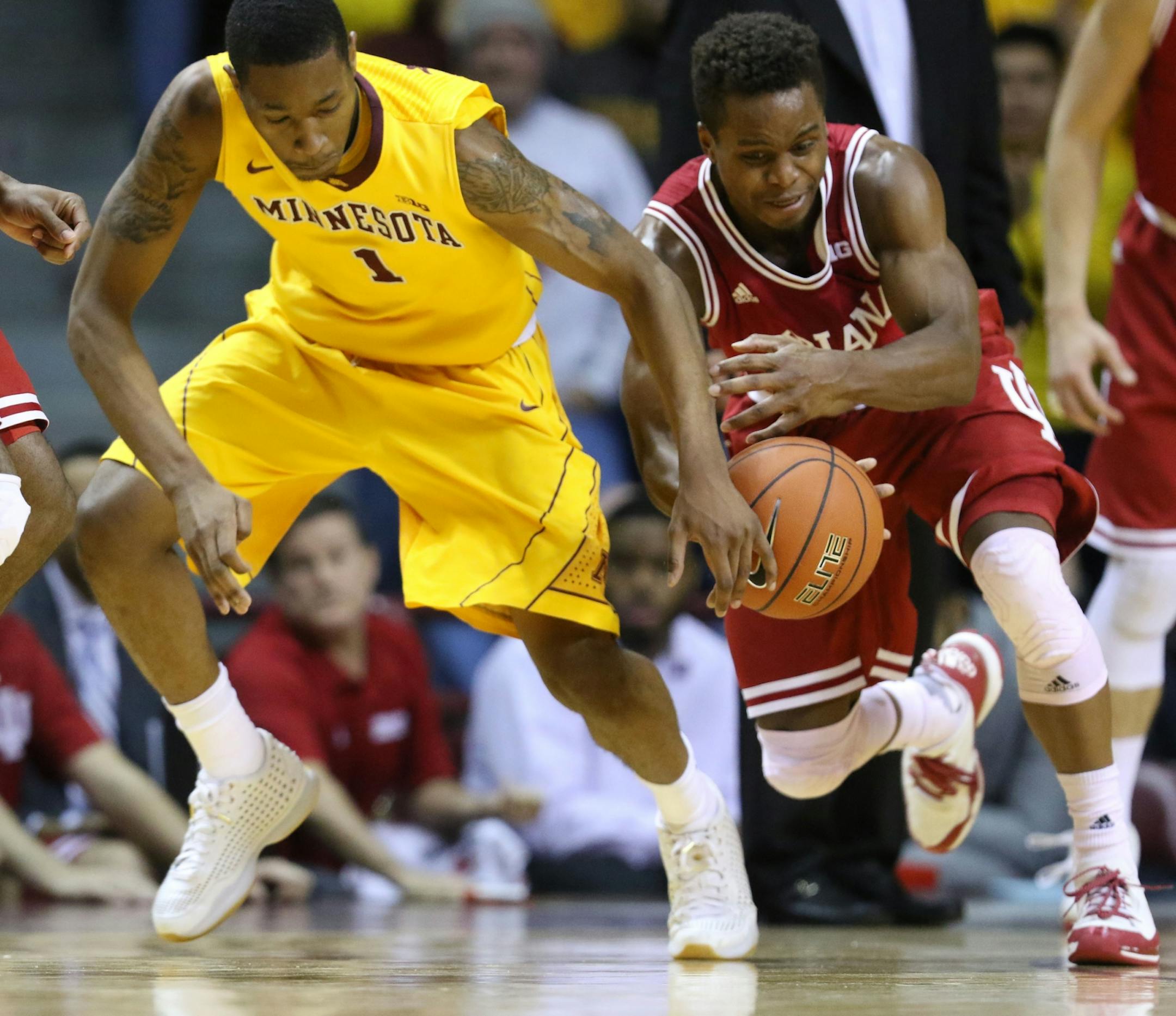 The University of Minnesota's Depree McBrayer (1) battles for a loose ball with the University of Indiana's Kevin Yog Ferrell (11) during the second half of the Gophers 70-63 loss Saturday, Jan. 16, 2016, at Williams Arena in Minneapolis, MN.