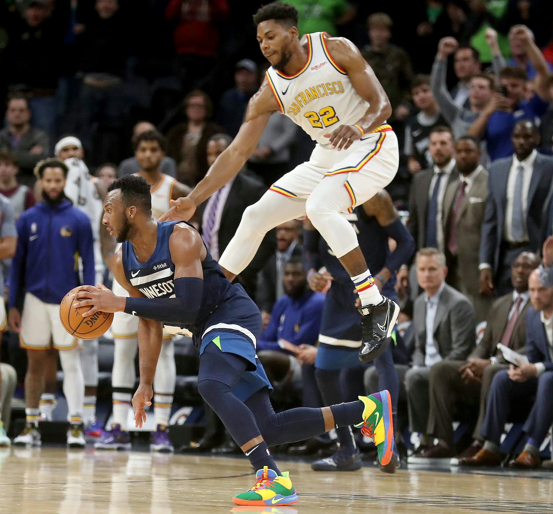 The Timberwolves Josh Okogie stole the ball during overtime as Golden State's Glen Robinson III attempted to cover