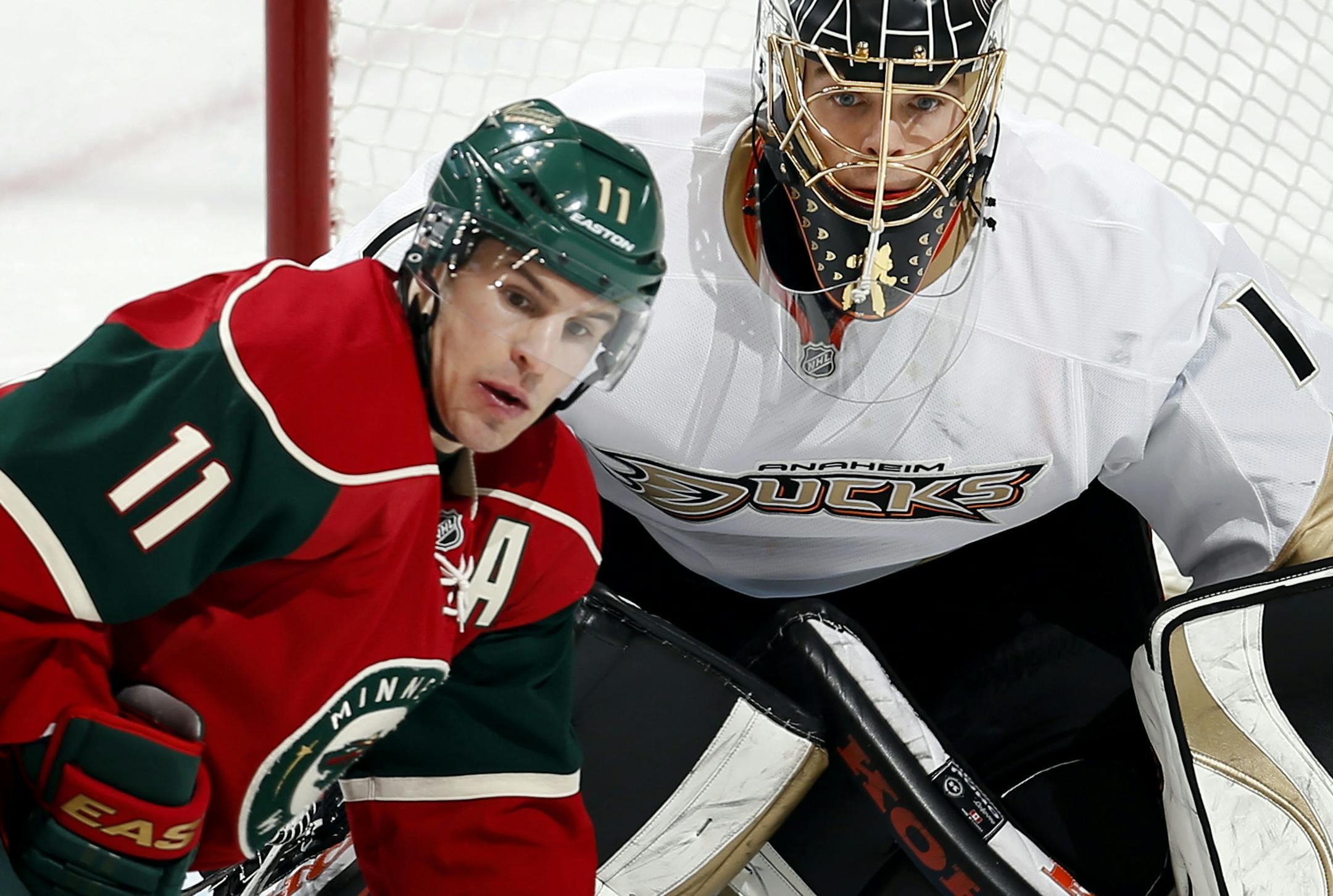 Zach Parise (11) waited for pass in front of Anaheim goalie Jonas Hiller (1) in the second period. ] CARLOS GONZALEZ cgonzalez@startribune.com - March 12, 2013, St. Paul, Minn., Xcel Energy Center, NHL, Minnesota Wild vs. Anaheim Ducks