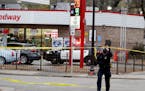 The scene near 25th and Bloomington Ave. S where a man was seriously wounded by gunfire in the parking lot of a Speedway Tuesday, Nov. 6, 2018, in Min