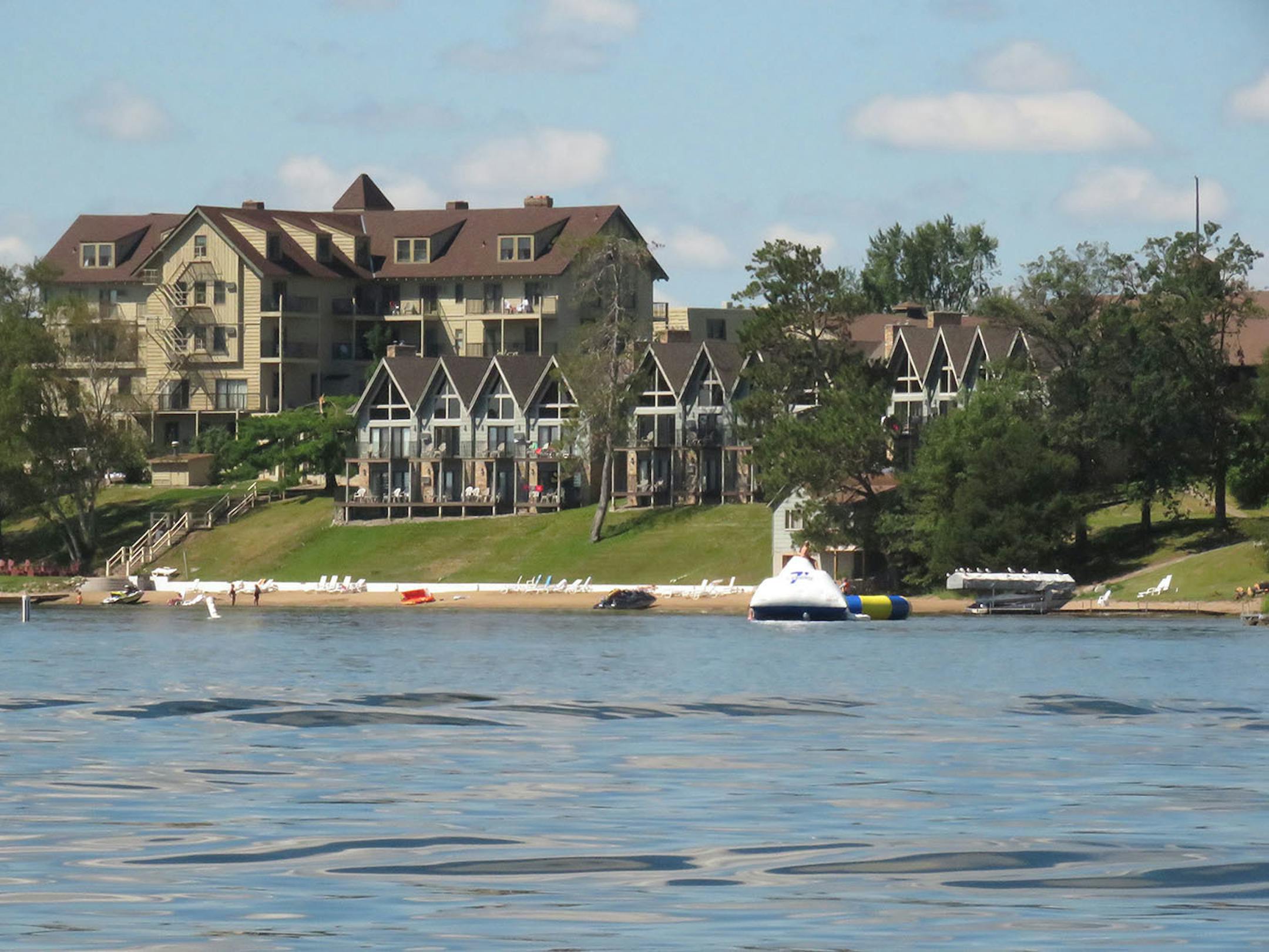 Sunrise Villas and Madden Inn and Golf Club dominate the Steamboat Bay view of Madden's Resort, which features additional lodging that wraps around Mission Point and the Wilson Bay side of Pine Beach Peninsula.