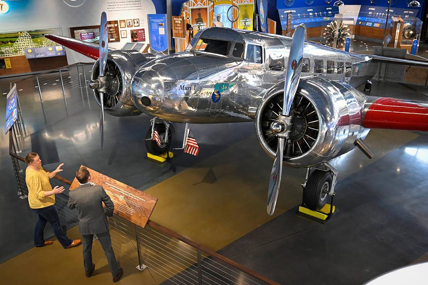 A Lockheed Electra 10-E aircraft named Muriel, the last one in the world, is the centerpiece of the new Amelia Earhart Hangar Museum in Atchison, Kansas. Makinzie Burghart, director of operations, escorted Douglass Adair of Exchange Bank &amp; Trust of Atchison, a founding donor, on a tour of the hangar museum in April. (Tammy Ljungblad/The Kansas City Star/TNS) ORG XMIT: 82517847W