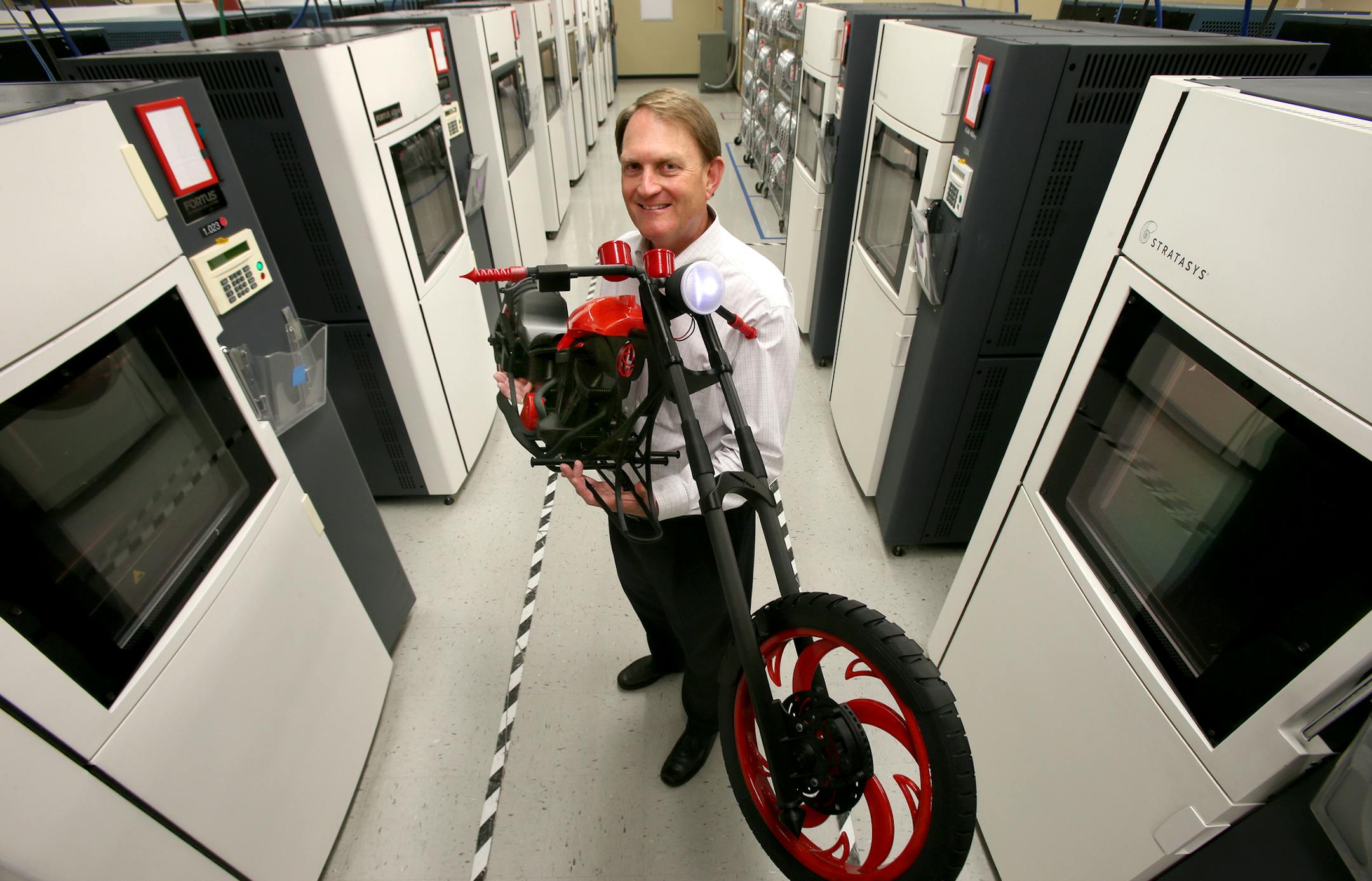 Scott Crump, the chairman and co-founder of Stratasys in Eden Praire, MN on August 29, 2013. ] JOELKOYAMA‚Ä¢joel koyama@startribune Stratasys, which is riding the wave of 3-D printer popularity, is adding about 160 jobs in Minnesota this year, even though it now officially headquartered in Israel. Minnesota is benefitting from last year's merger of Stratasys with Israeli firm Objet, which made the combined firm No. 1 in markets ranging from automotive design to consumer jewelry,