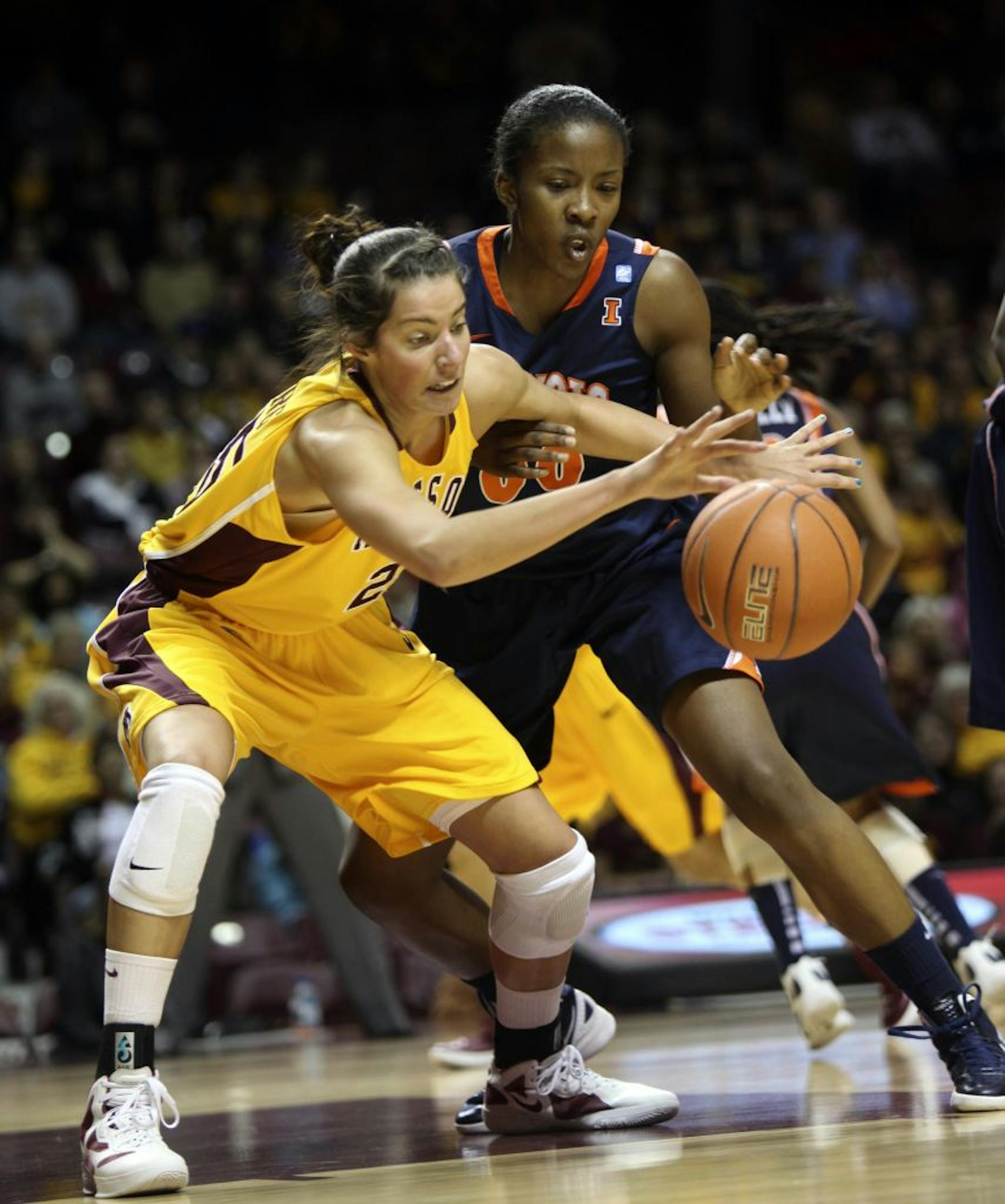 Katie Loberg fought over a loose ball with the Illini's Karisma Penn
