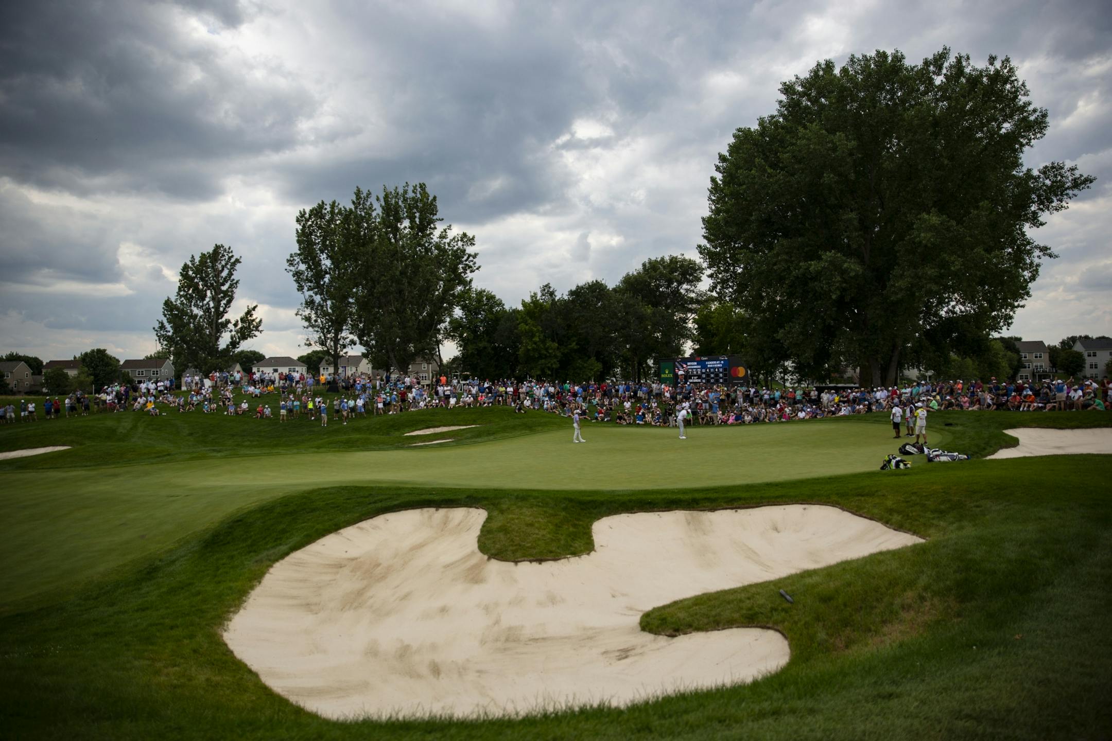 Bryson DeChambeau putts on the back nine under an overcast sky. ALEX KORMANN ¥ alex.kormann@startribune.com Competitors for the 3M Open took to the course on Saturday.