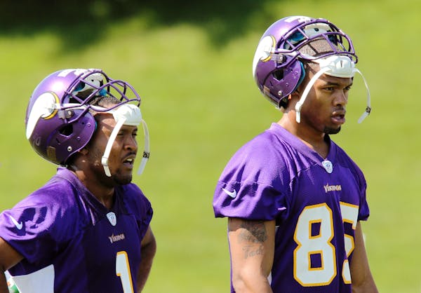 In 2012, Jarius Wright, left, and Greg Childs were Vikings receivers in rookie minicamp, both fresh out of Arkansas. Wright remains with the Vikings, 