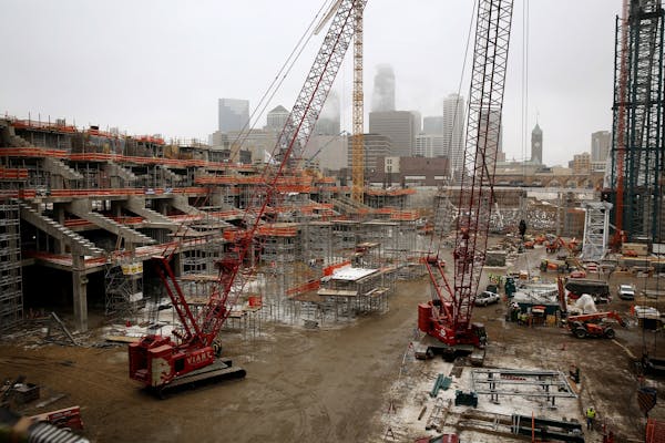 Construction continued at the Vikings stadium, being built by M.A. Mortenson, in December.