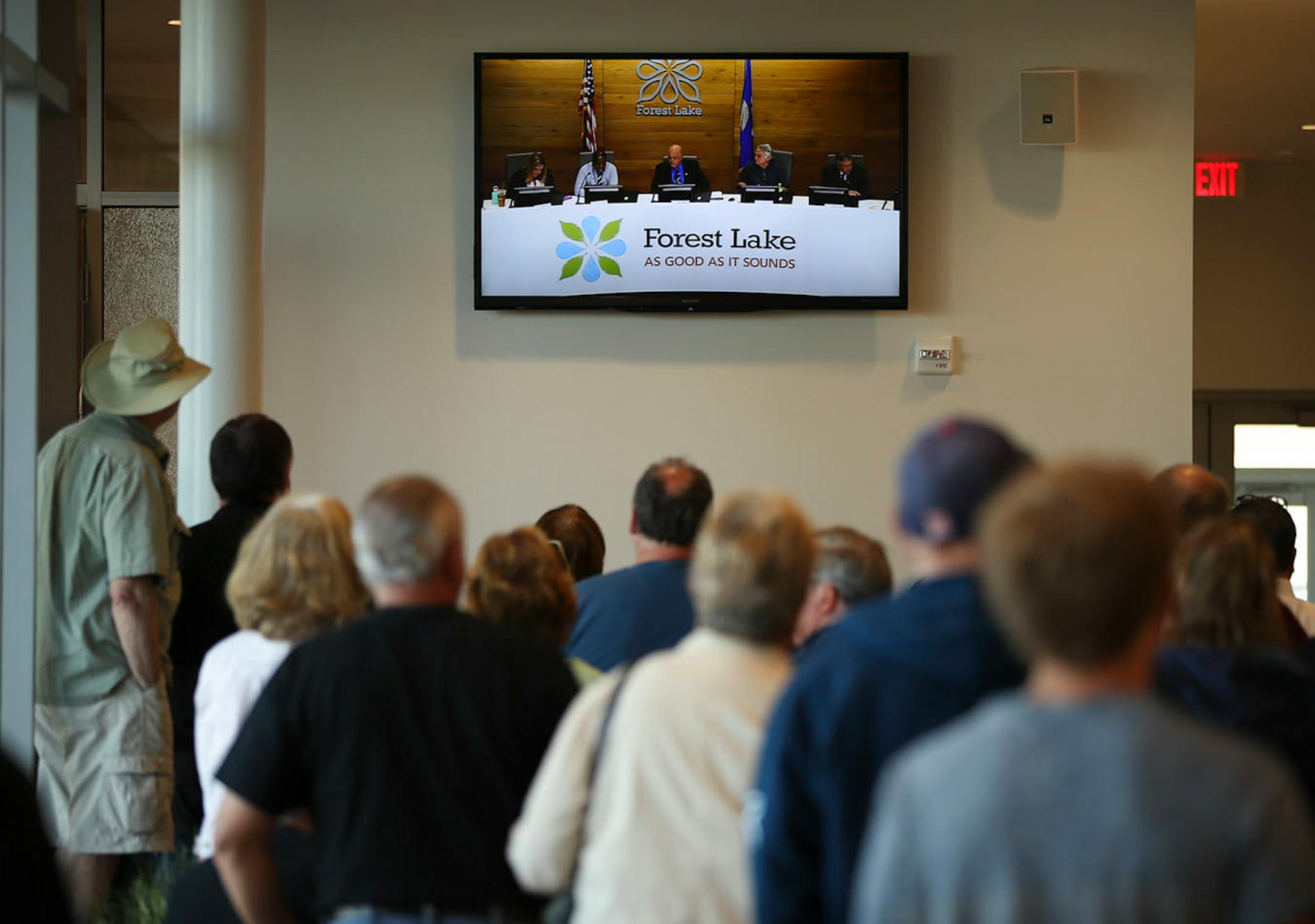An overflow crowd watched the Forest Lake City Council meeting take up the issue of the police department Monday evening.