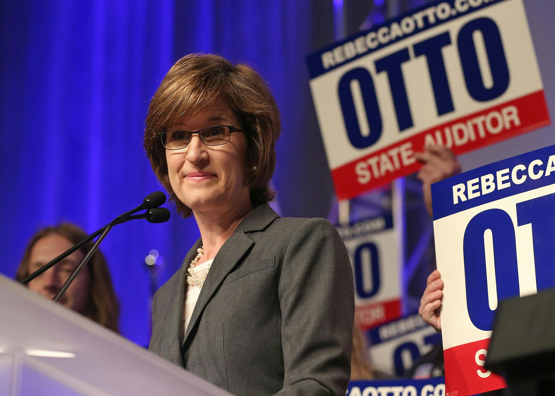 State Auditor Rebecca Otto addresses the Minnesota Democratic-Farmer-Labor Party Convention, Saturday, May 31, 2014 in Duluth, Minn. where she was endorsed by acclimation for the position. (AP Photo/Jim Mone) ORG XMIT: MIN2014053117143872 ORG XMIT: MIN1405311723390085