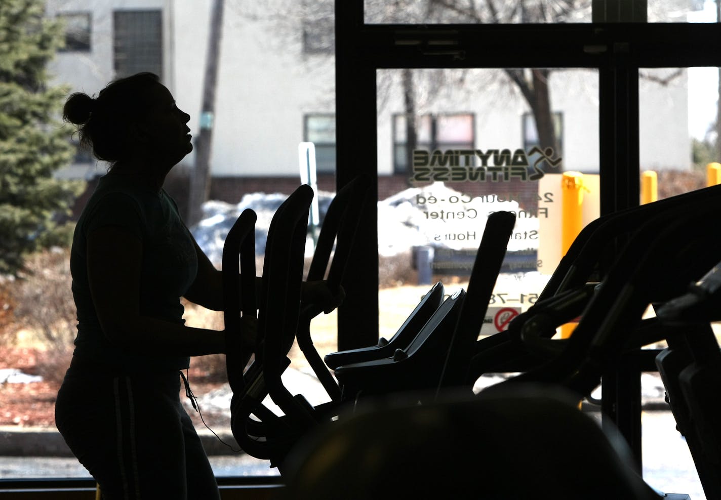 Customers worked out at the Anytime Fitness in the Sibley Plaza in St. Paul.