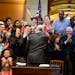 The Rotunda crowd cheered after Governor Mark Dayton signed the minimum wage bill into law at a public bill signing ceremony Monday the Minnesota Stat