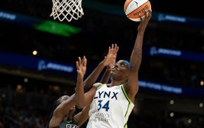 Lynx center Sylvia Fowles went up for a shot against Storm center Ezi Magbegor on Friday night in Seattle. Fowles scored 16 points, leaving her with 5
