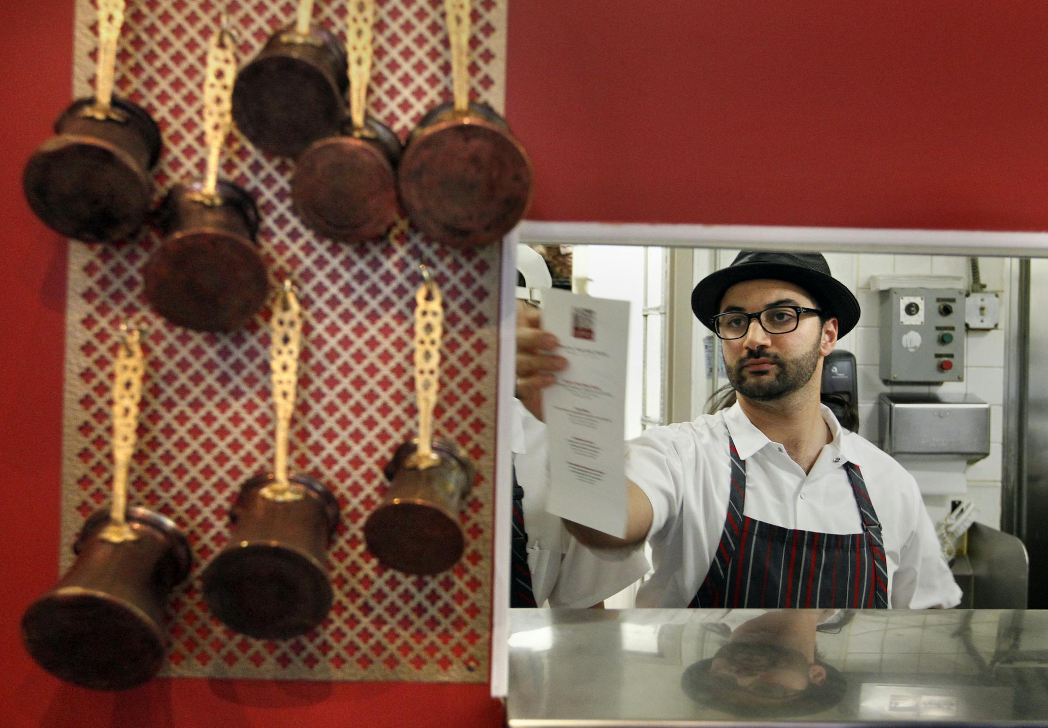 Profile on the young chef, Sameh Wadi of Saffron. The restaurant opened in February 2007 and specializing in contemporary Mediterranean and Middle Eastern cuisine, we feature a seasonal menu which utilizes only the highest quality ingredients. Tasting menu clients and dishes giving us an looking the man. [ TOM WALLACE • twallace@startribune.com _ Assignments #20022920A_ April 12, 2011_ SLUG: chef0426_ EXTRA INFORMATION: CQ'ed by internet.