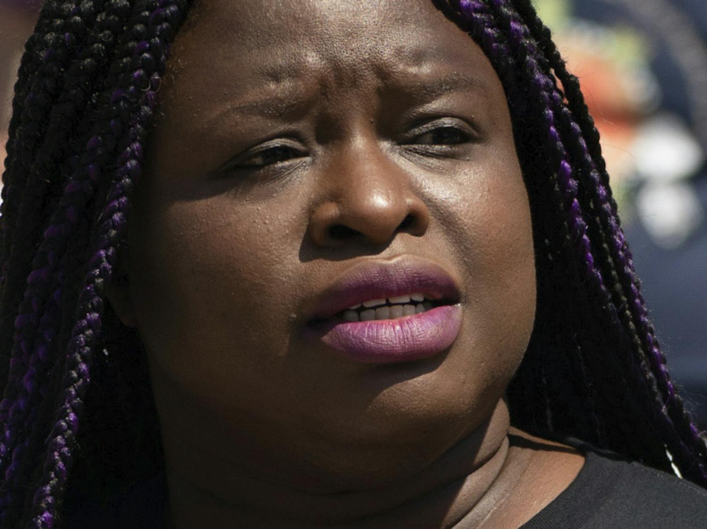 Wearing an anti-Bob Kroll tee shirt, Nekima Levy Armstrong speaks outside the Capitol Friday, June 12, 2020 in St. Paul, Minn. CAIR-Minnesota joined a coalition of other civil rights groups outside the State Capitol Friday morning, calling for what they called real change. (Glen Stubbe/Star Tribune via AP)