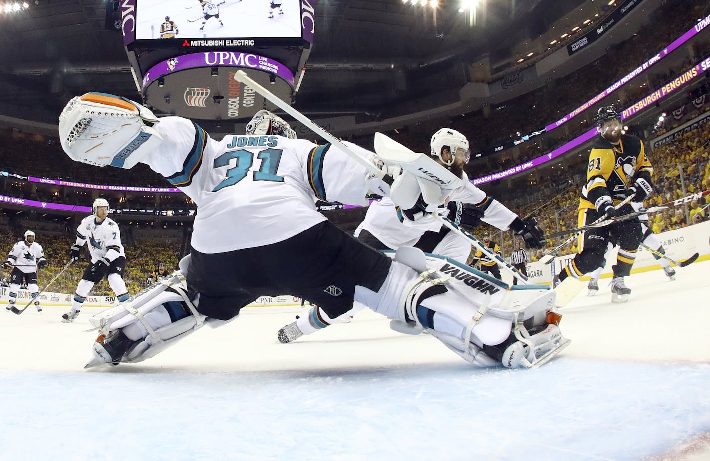 San Jose Sharks goalie Martin Jones (31) defends against Pittsburgh Penguins' Phil Kessel (81) during the second period in Game 1 of the Stanley Cup final series Monday, May 30, 2016, in Pittsburgh. (AP Photo/Bruce Bennett)