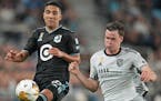 Minnesota United star Emanuel Reynoso, left, hasn't played for the team since March 16.