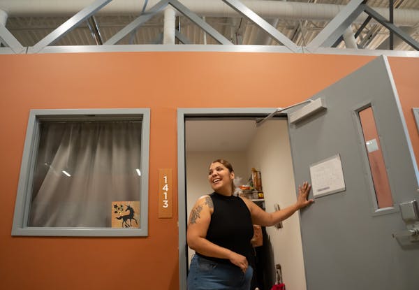 Resident Cynthia Lamas, in her Avivo Village residence, spent most of last year living in her car. “My goals right now are to be productive and keep