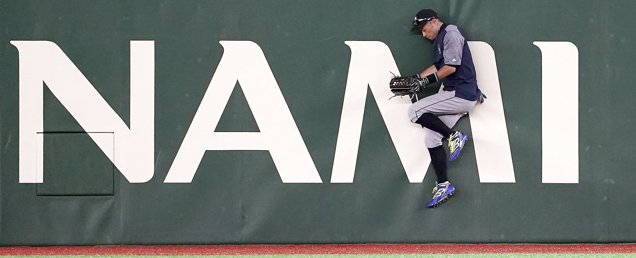 Ichiro Suzuki of the Seattle Mariners jumps during his team's practice at Tokyo Dome in Tokyo Saturday, March 16, 2019. Ichiro is back in his native Japan and enjoying it while he can. He will play for the Mariners against the Oakland Athletics in the first two games of the Major League Baseball season on March 20-21. (AP Photo/Eugene Hoshiko)