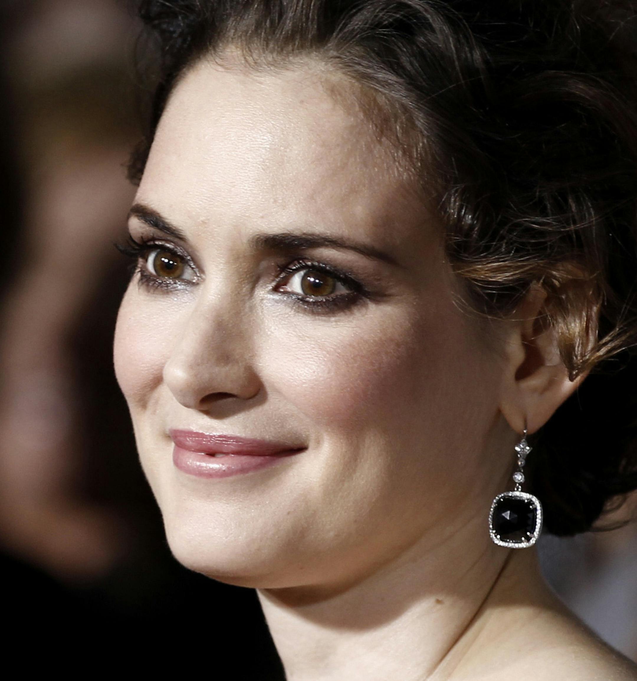 Cast member Winona Ryder arrives at a screening of "Black Swan" on the closing night of American Film Institute's AFI Fest 2010 in Los Angeles on Thursday, Nov. 11, 2010. (AP Photo/Matt Sayles) ORG XMIT: MIN2013100214543942
