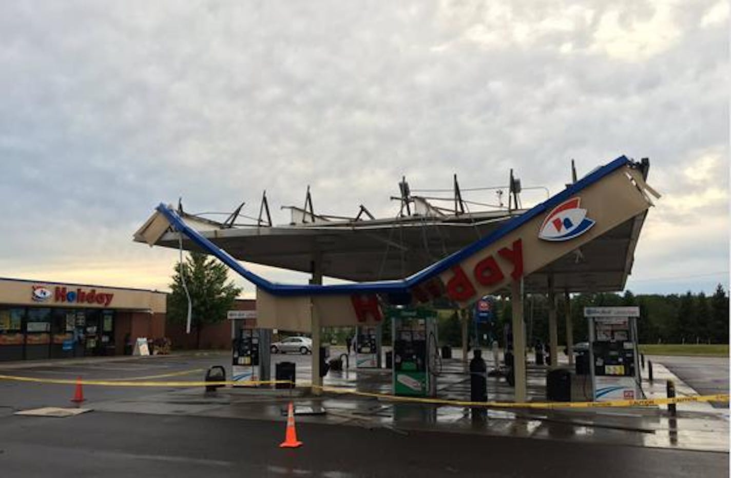 A storm damaged a Holiday gas station at Arrowhead and Rice Lake roads in Duluth.