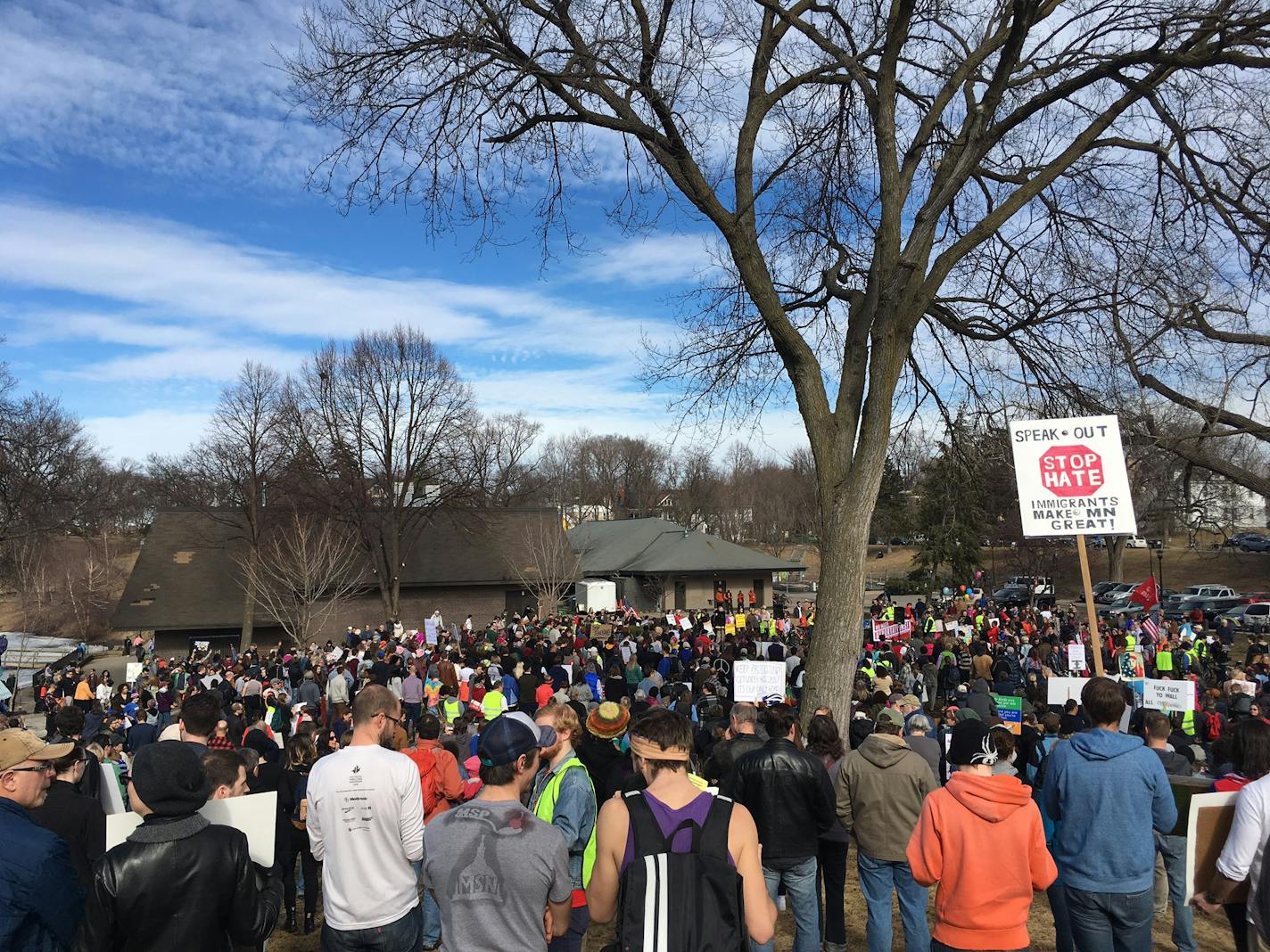 Protesters gather Saturday at Powderhorn Park in Minneapolis to show support for immigrants and refugees.