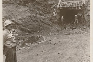 The miner on the left in the background is Aaron Brown's grandfather, the son of the man in the foreground, Brown's great-grandfather.