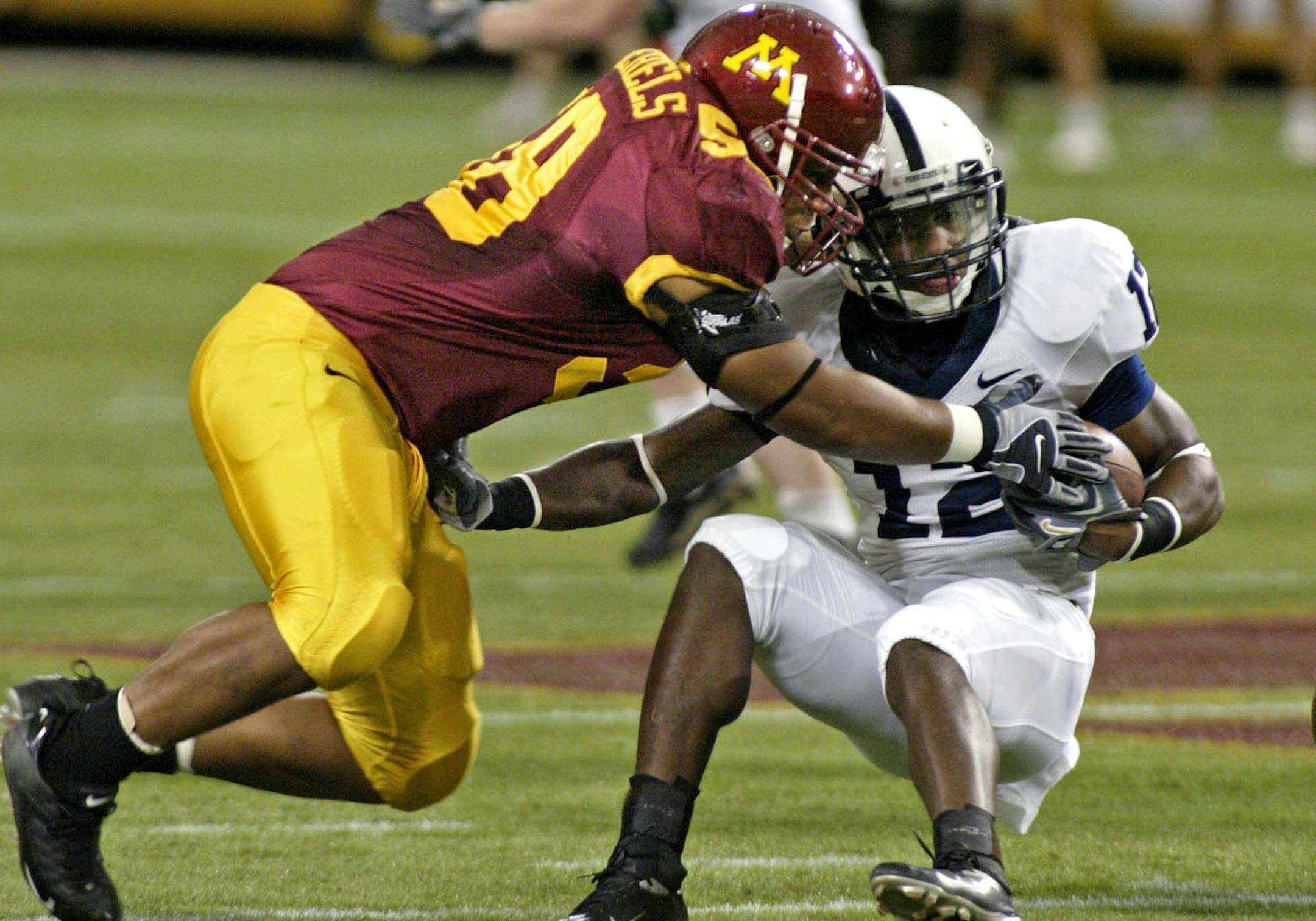 MARLIN LEVISON * mlevison@startribune.com 10/12/06 Assign# 106642 GENERAL INFORMATION: Gopher linebacker Mike Sherels was honored this week for his defensive play against Penn State. IN THIS PHOTO: Sherels tackles Penn State's A.J. Wallace #12, running with the ball.