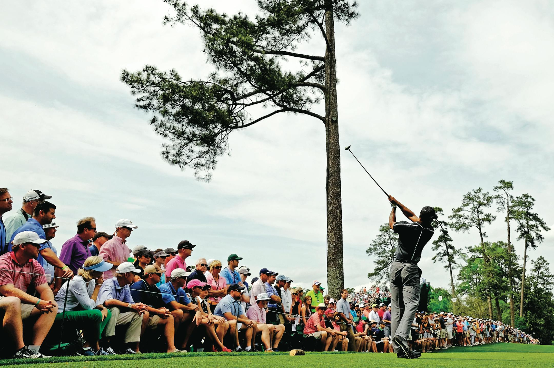 Tiger Woods tees off on the 18th hole during the second round of the Masters golf tournament Friday, April 10, 2015, in Augusta, Ga. (AP Photo/David J. Phillip)