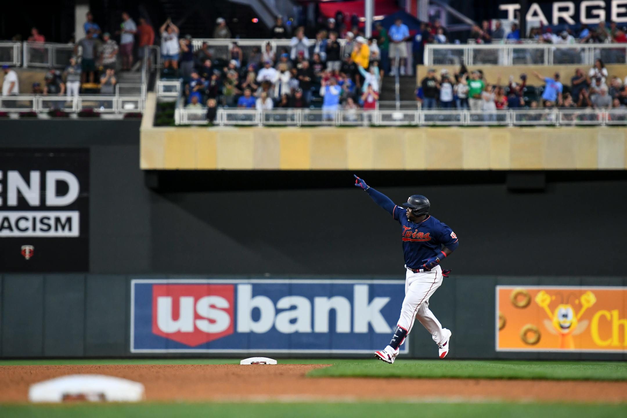 Minnesota Twins first baseman Miguel Sano (22) rounded the bases after he hit a solo home run in the bottom of the seventh inning against the Detroit Tigers.