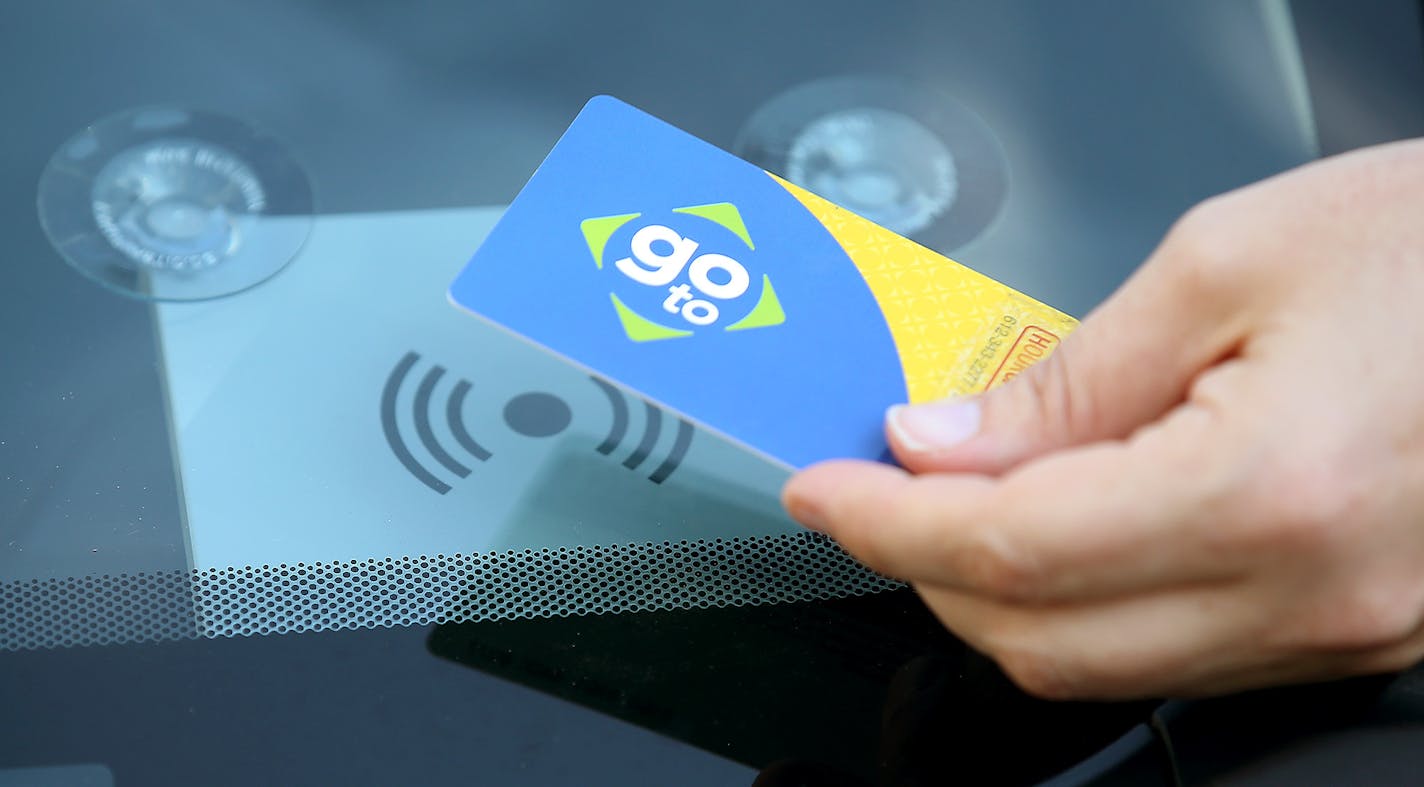 Megan Hansen of Hourcar demonstrated how the new system that allows Go To card holders to check out vehicles that will be available later today, Friday, September 4, 2015 in St. Paul, MN. Metro Transit is making a deal with HourCar to allow commuters to use their Go-To cards for both transit and car sharing.