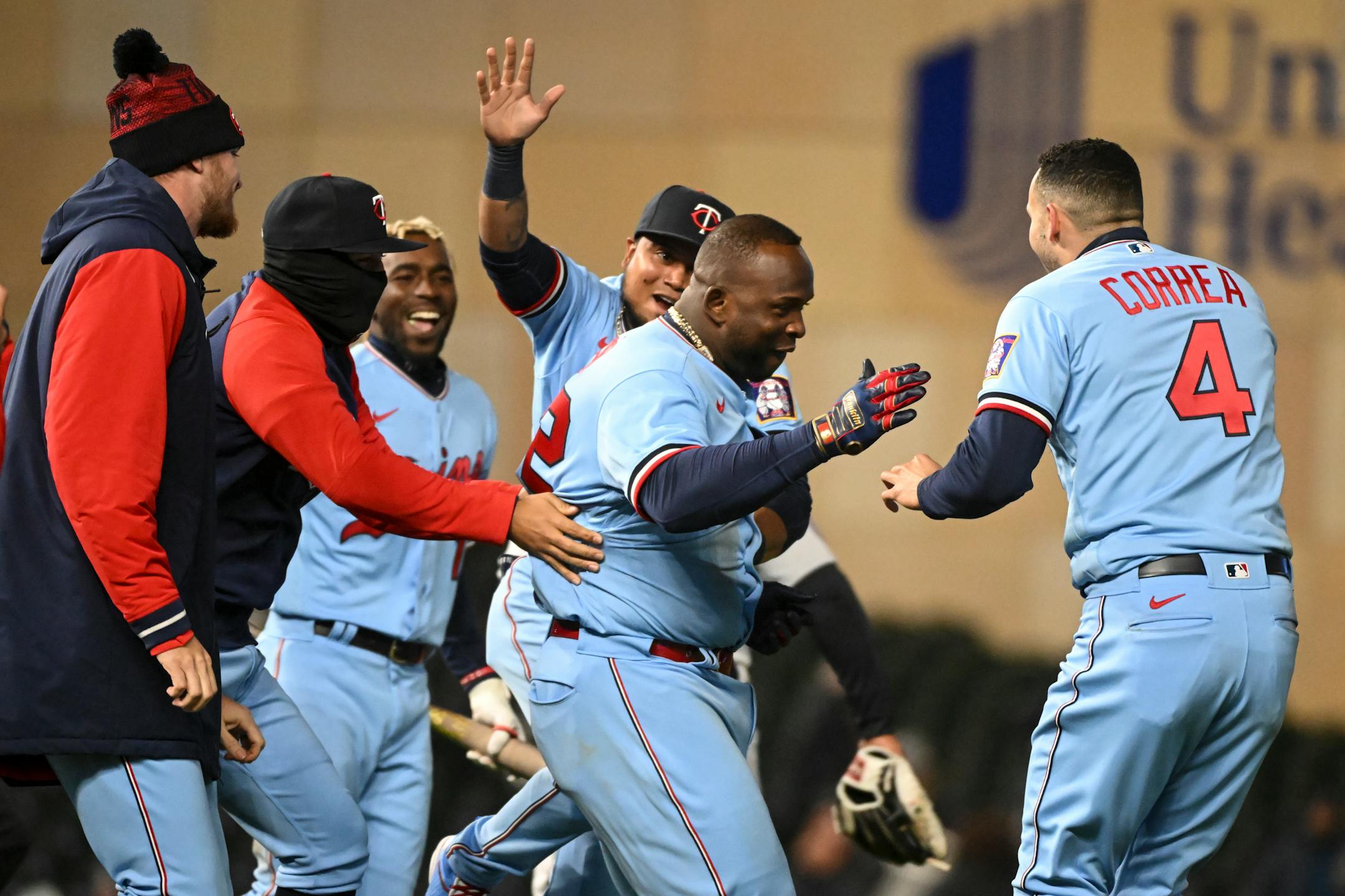 Teammates celebrate with Minnesota Twins first baseman Miguel Sano (22) after his 9th inning single, which lead. to a throwing error and two runs, giving the Twins a 5-4 walk-off victory against the Detroit Tigers.