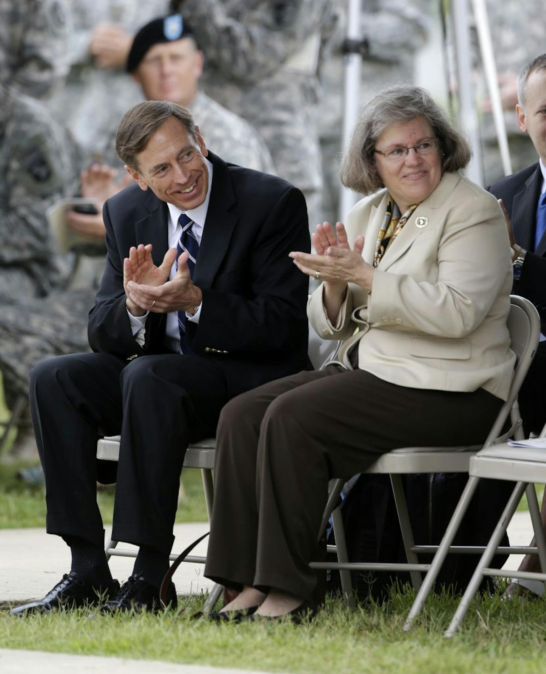 CIA Director David Petraeus and his wife, Holly, at a ceremony at Fort Campbell, Ky., last August. She's a strong advocate for military families