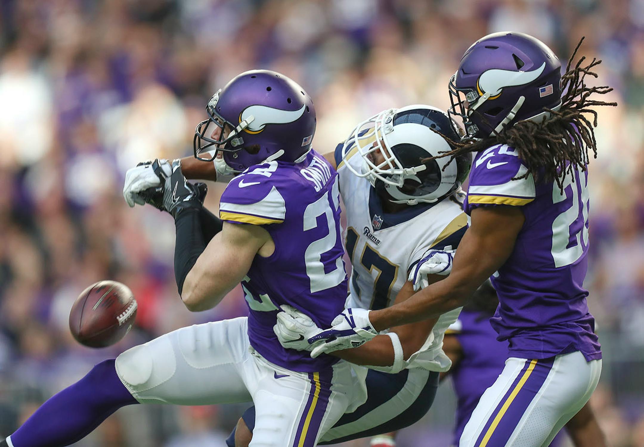 Vikings Harrison Smith breaks up a long pass, almost making an interception, intended for Rams Robert Woods in the 4th quarter.