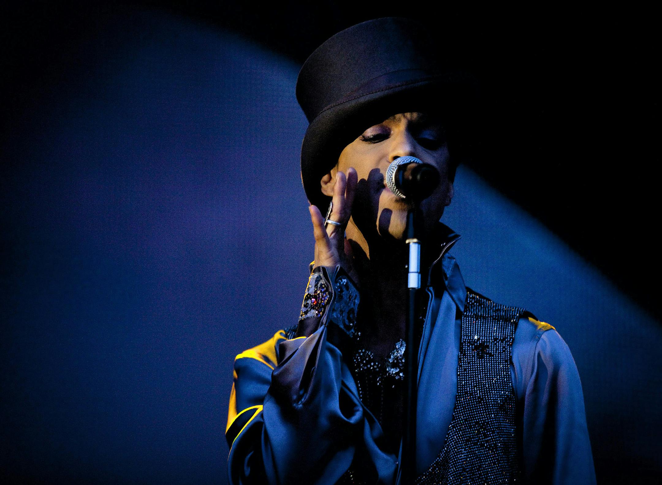 FILE - In this Aug. 6 2011 file photo, American singer and songwriter Prince performs on the Isle of Amager in Copenhagen, Denmark. Prince now owns the rights of the music he recorded on Warner Bros. Records after years of disputes and battles with the record label. Warner Bros. announced Friday, April 18, 2014, that it reached an agreement with the pop icon. Prince was signed to label from 1978 to mid-1990s, during which he released key projects like “Purple Rain,” “1999&#x