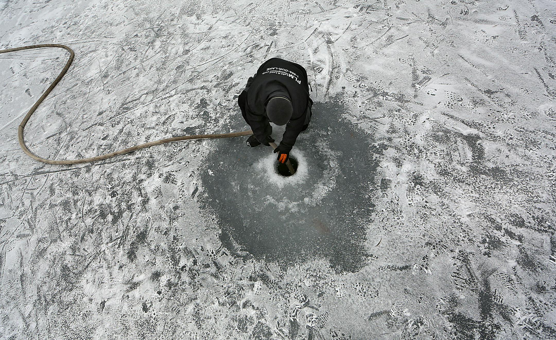 Aquatic applicator Travis Aune injected a solution containing potash through the ice and into Christmas Lake.] JIM GEHRZ &#x201a;&#xc4;&#xa2; james.gehrz@startribune.com / Shorewood, MN / December 19, 2014 /11:00 AM BACKGROUND INFORMATION: The Minnesota DNR and a contractor injected potassium chloride (potash) under the ice of on Christmas Lake in Shorewood, the third place in the country and first in Minnesota to try to use potash to kill off zebra mussels. The contractor is Invasive Plant Mana