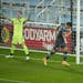 Minnesota United midfielder Robin Lod (17) celebrated after headed a second half pass into the goal past an incredulous Chicago Fire goalkeeper Bobby 