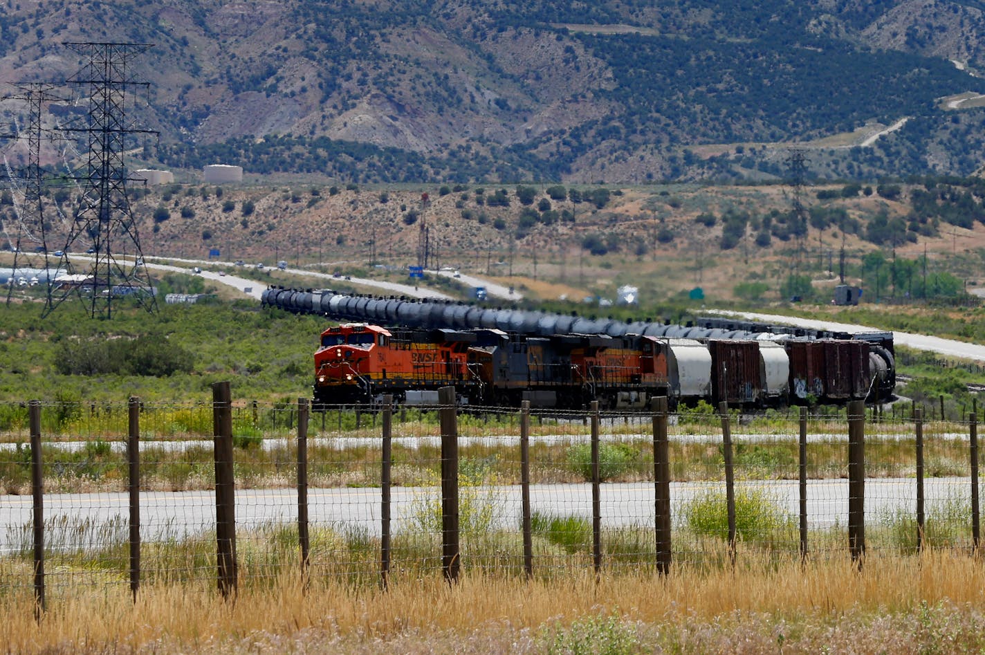 A Burlington Northern Santa Fe Corp. (BNSF) train hauls oil cars outside Rifle, Colorado, U.S., on Friday, June 20, 2014. Natural gas futures dropped to a four-week low in New York on speculation that a spell of mild weather will cause bigger-than-average stockpile gains. Photographer: George Frey/Bloomberg