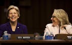 FILE-- Sen. Elizabeth Warren (D-Mass.), left, and Secretary of State Hillary Rodham Clinton at a hearing for John Kerry's confirmation as secretary of