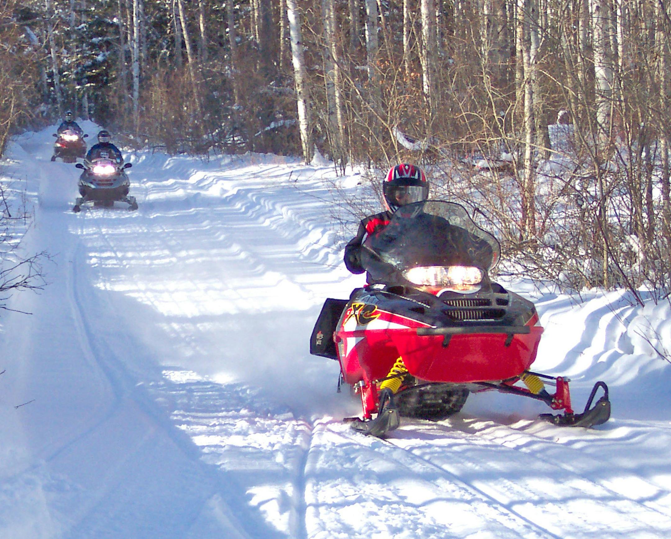 In winters of good snow, riders and their machines regularly travel Minnesota's thousands of miles of groomed snowmobile trails.