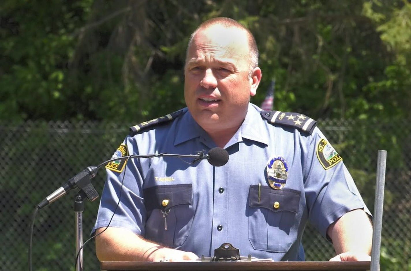 St. Paul Police Chief Todd Axtell spoke prior to seventeen police canines and their human partners graduated from St. Paul's K-9 training program. A program featuring obedience, agility and suspect apprehension was given in front of a crowd of dozens at the Timothy J. Jones Canine Training Facility in Maplewood on Thursday, May 24, 2018.