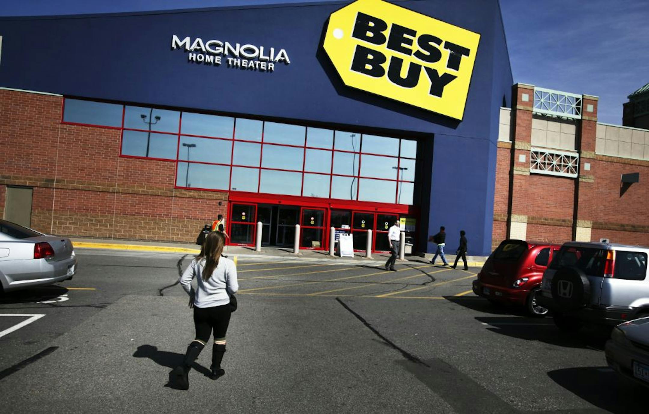 Shoppers head to and from the Best Buy in Richfield, MN, Thursday, March 28, 2012.