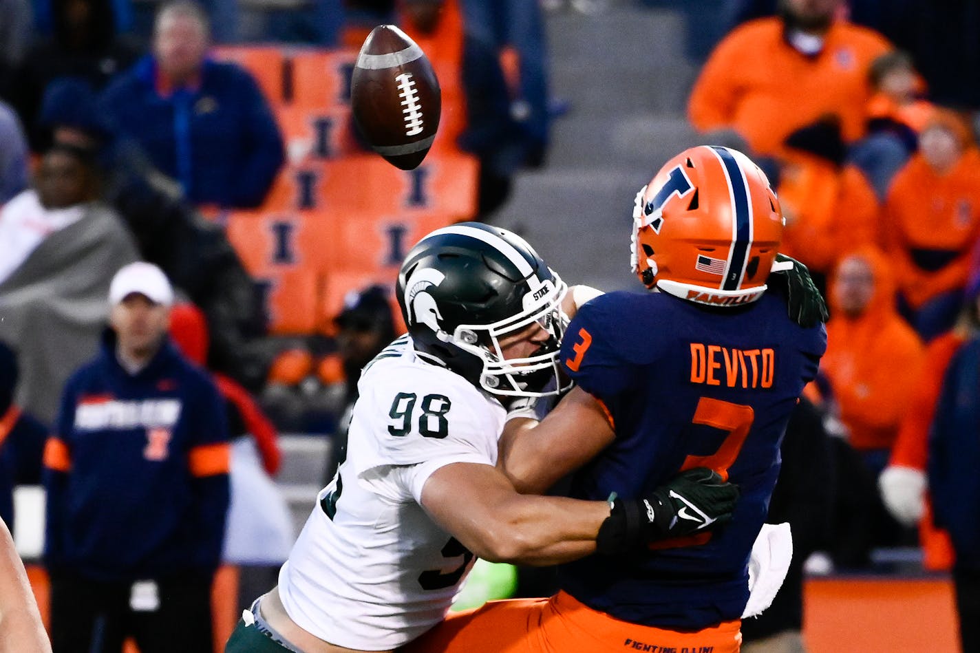 Michigan State defensive end Avery Dunn (98) breaks up a pass thrown by Illinois quarterback Tommy DeVito (3) during the second half Nov. 5.