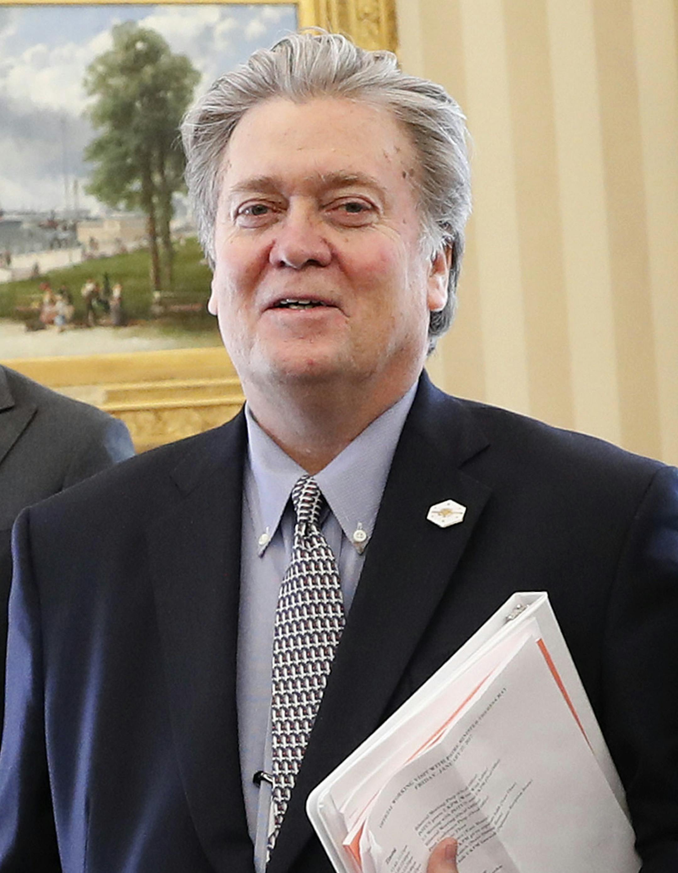 From left, White House Senior Advisers Jared Kushner, Steve Bannon and National Security Adviser Michael Flynn are seen in the Oval Office of the White House in Washington, Friday, Jan. 27, 2017, during a meeting between President Donald Trump and British Prime Minister Theresa May. (AP Photo/Pablo Martinez Monsivais)
