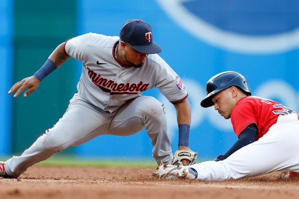 Steven Kwan of the Guardians stole second Wednesday as Twins second baseman Luis Arraez applied a late tag.