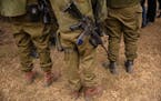 Israeli soldiers in Kfar Azza, Israel, on Oct. 27, 2023.